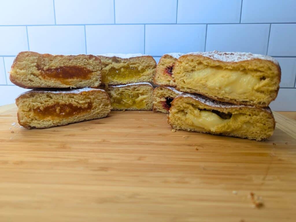 Image shows four flavors of paczki from County Donuts in Schaumburg.