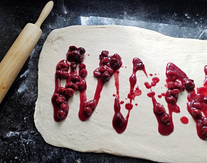 Add cherries to dough