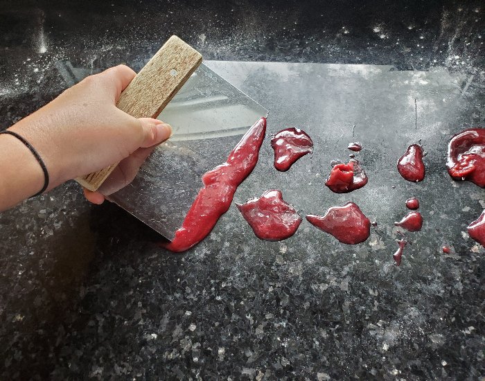 Clean with a bench scraper