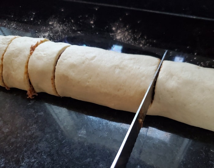 Slice rolls with a serrated knife