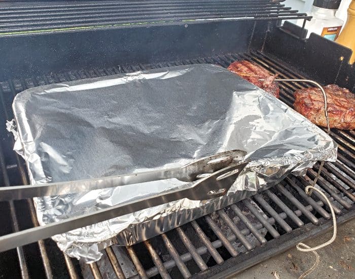 Cover corn with foil and shake periodically