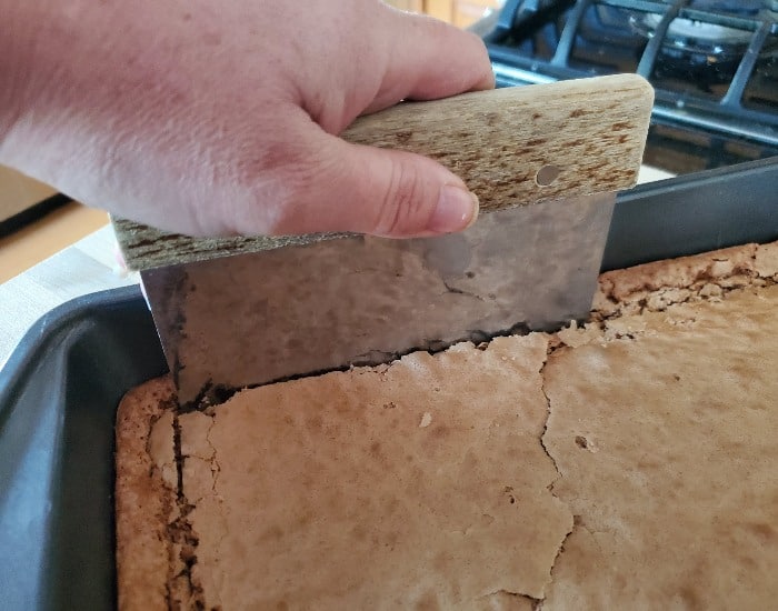 Cut off edges of brownies