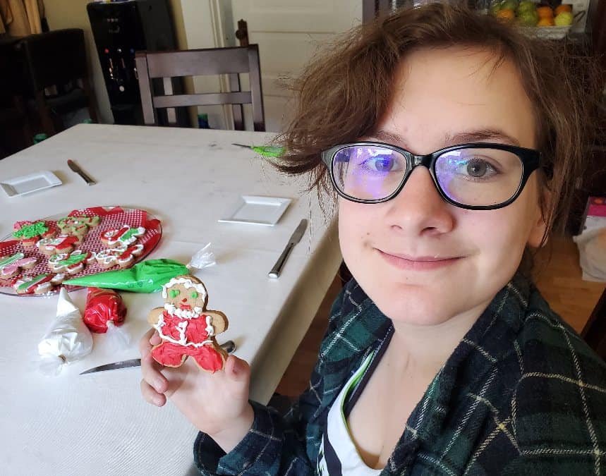 Girl holding a gingerbread man