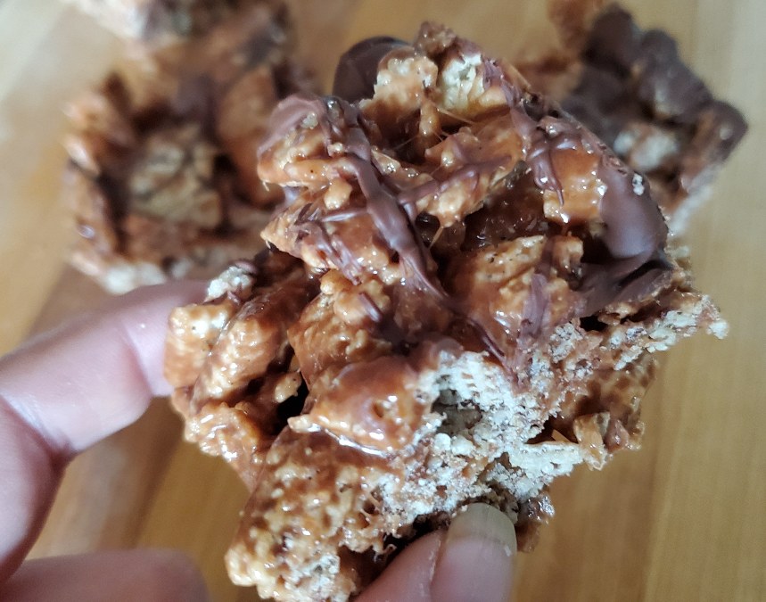 closeup of chocolate cereal bar with others in the background
