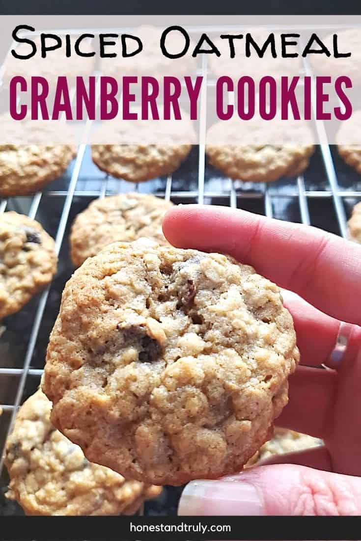 Close up of a cranberry cookie over a wire rack