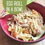 Overheard of egg roll in a bowl in a red bowl with text the best egg roll in a bowl.