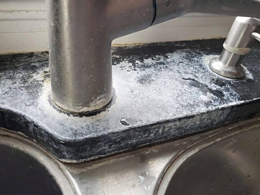 Hard water on a kitchen sink.