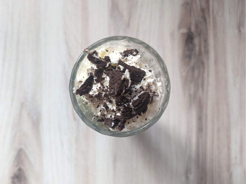 Image shows an Overhead shot of a copycat oreo shamrock mcflurry.