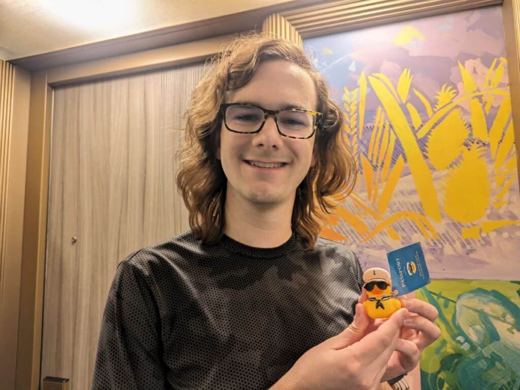Image shows a Happy kid finding a cruising duck.