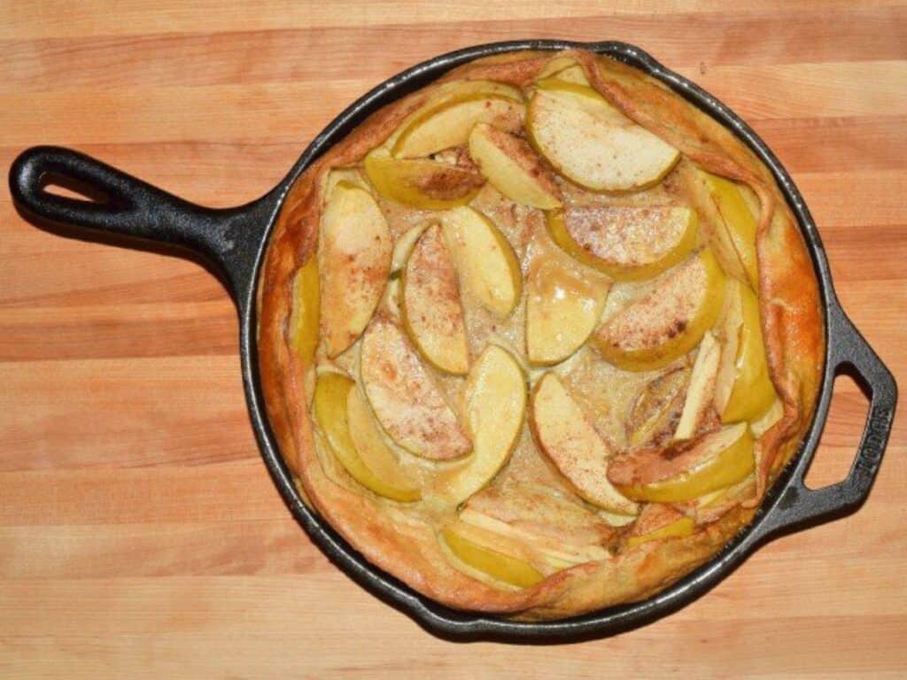 Image shows delicious and homemade Dutch apple pancake.