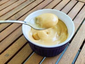 Image shows delicious bite of classic butterscotch pudding.