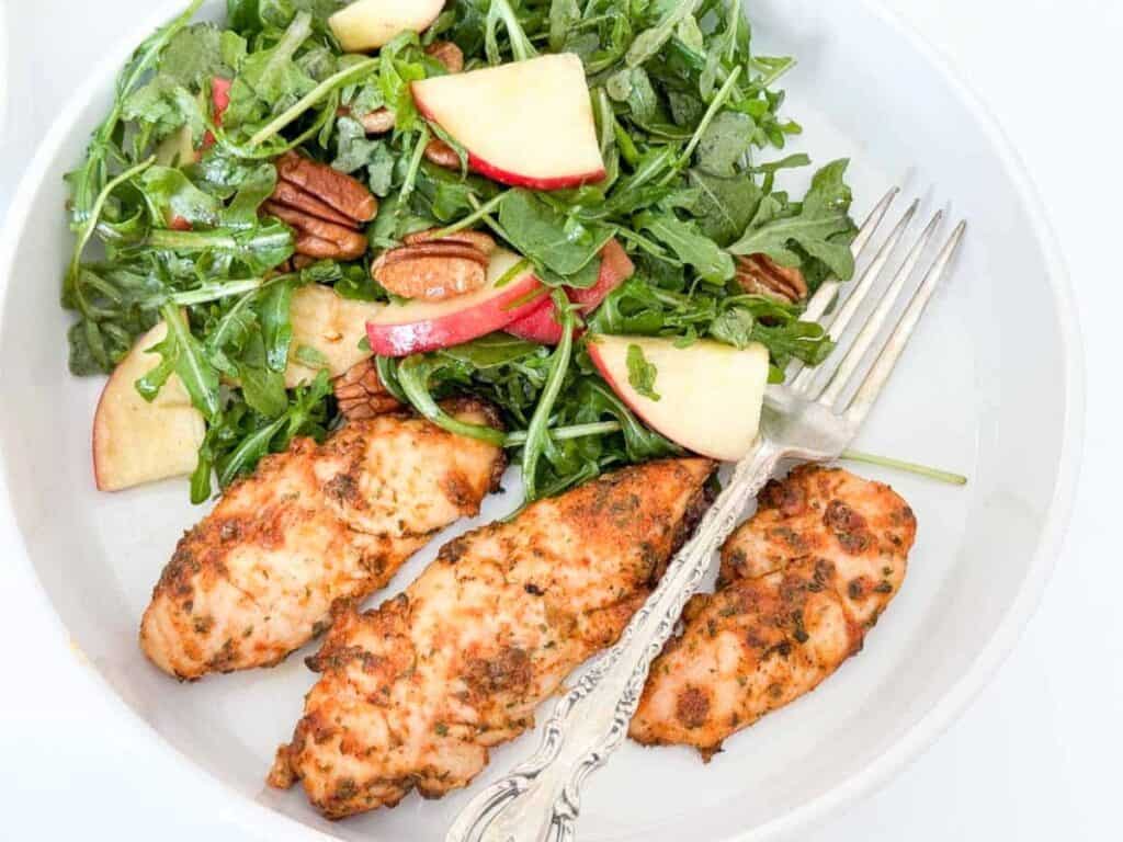 Image shows delicious oven baked ranch chicken.