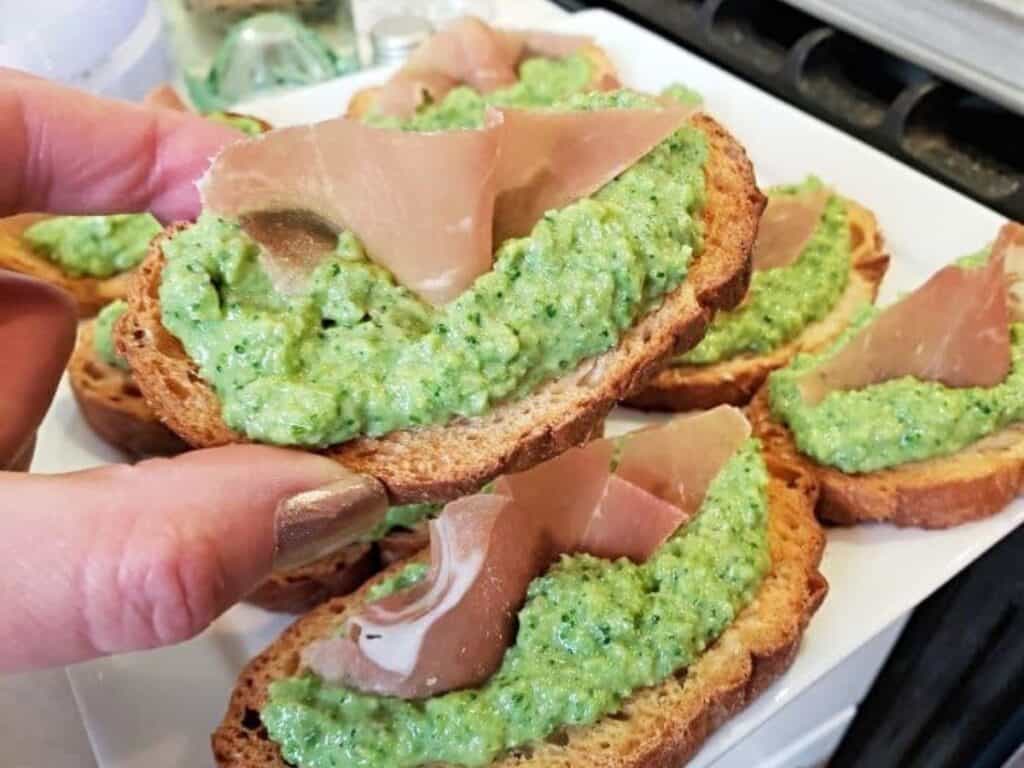 Image shows easy to make whipped vegetable bruschetta.