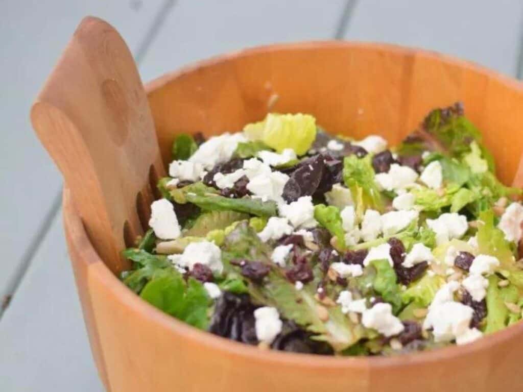 Image shows goat cheese and dried cherry salad recipe.