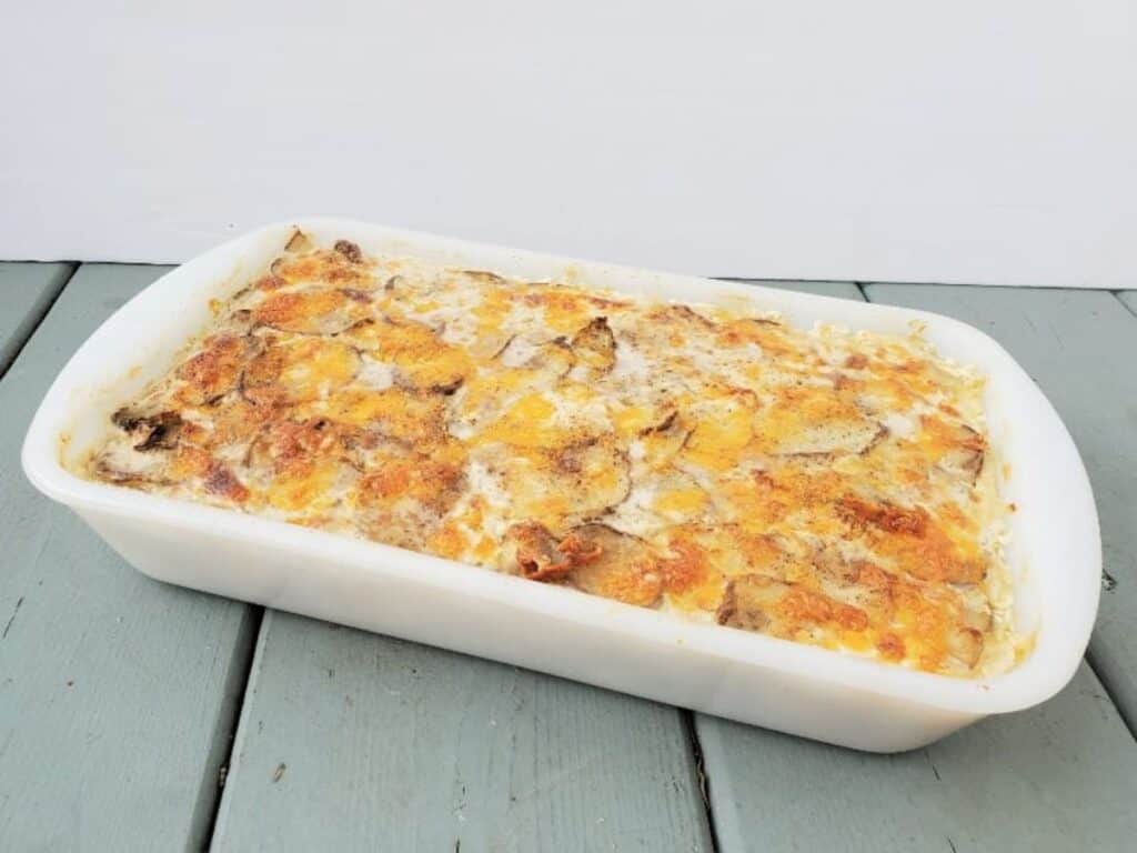 Image shows cheesy scalloped potatoes recipe.