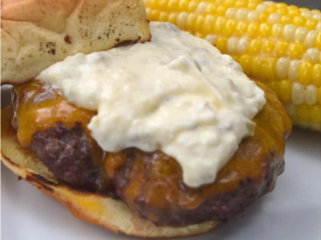 Image shows chipotle burger with jalapeno mayo recipe.