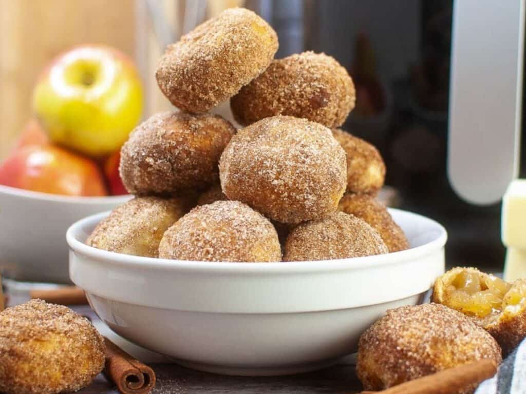 Image shows delicious air fryer apple pie bites.