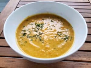 Image shows delicious carrot ginger soup.