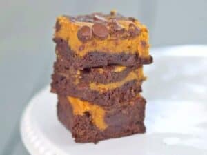 Image shows delicious pumpkin swirl brownies.