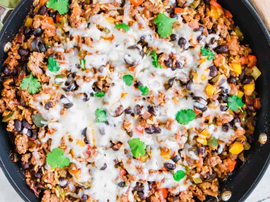 Image shows easy to make Mexican ground beef skillet.