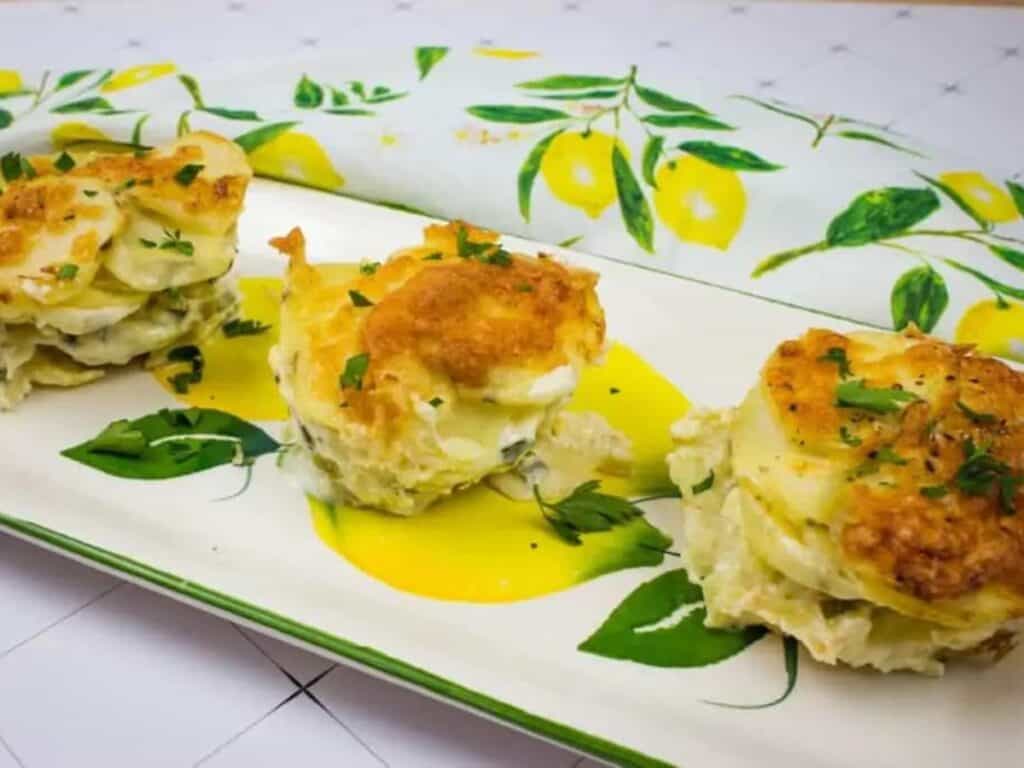 Image shows easy to make au gratin potato stacks.
