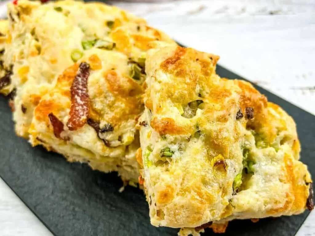 Image shows irresistible bacon cheddar and green onion scones.