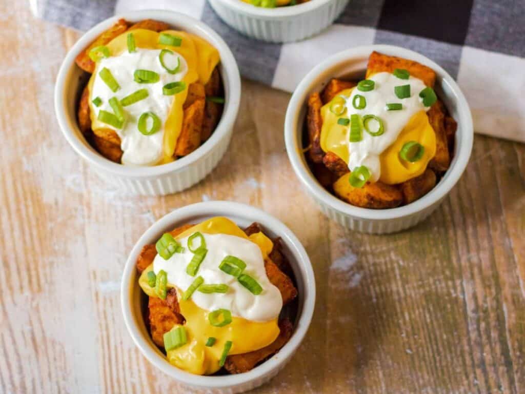 Image shows irresistible cheesy fiesta potatoes.