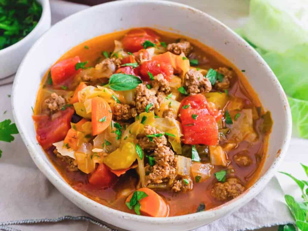 Image shows irresistible instant pot cabbage soup