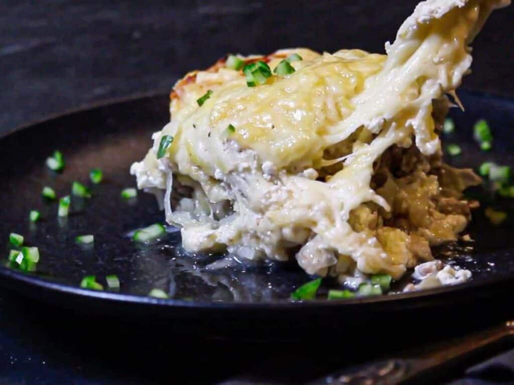 Image shows irresistible sauerkraut casserole with ground beef.