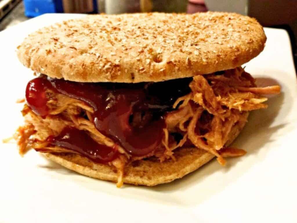 Image shows irresistible slow cooker pulled pork.