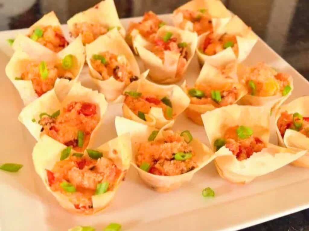 Image shows irresistible tomato bacon cups.