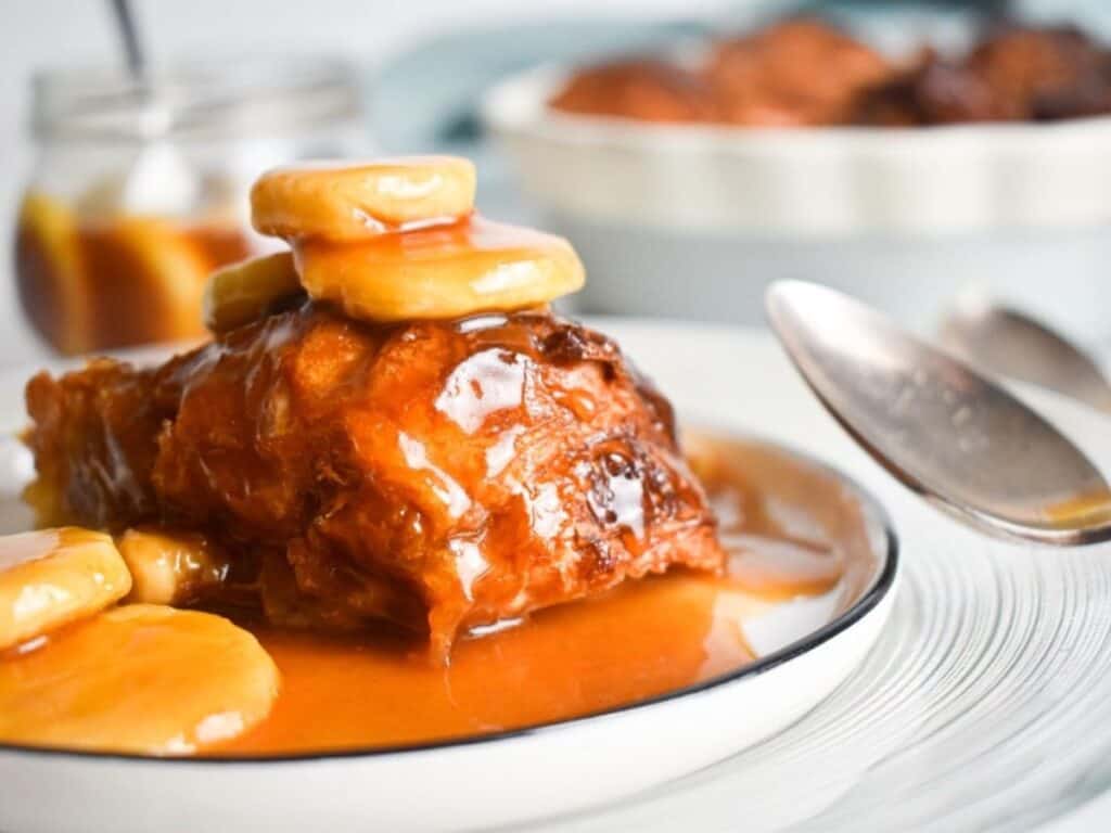 Image shows bananas foster croissant bread pudding recipe.