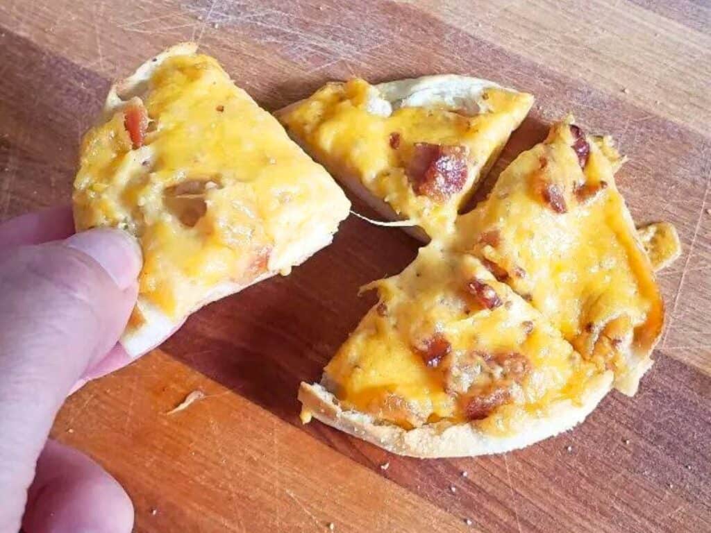 Image shows delicious boozy bacon cheddar bites pulled.