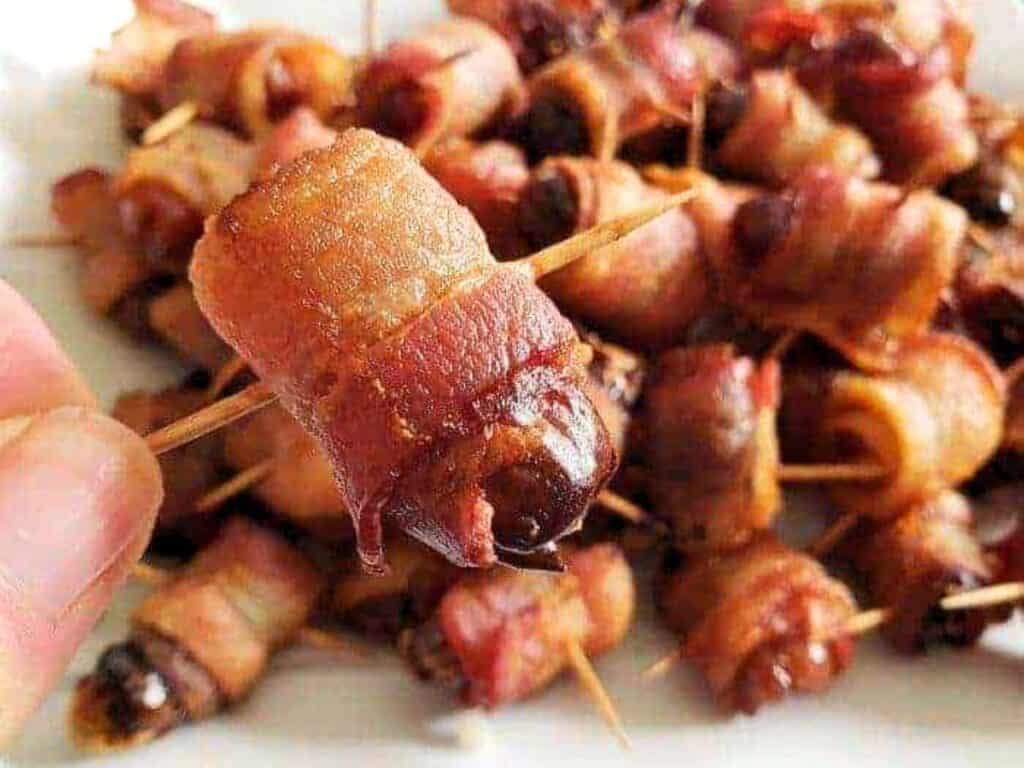 Image shows easy homemade bacon wrapped dates