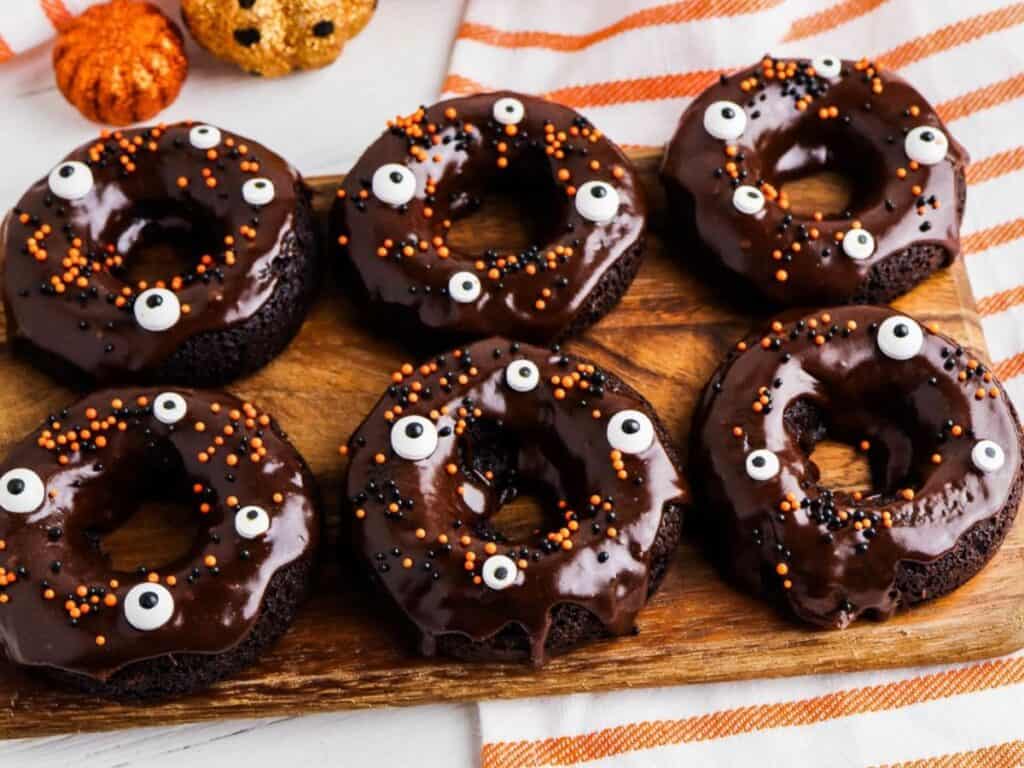 Image shows irresistible Halloween cake mix donuts.