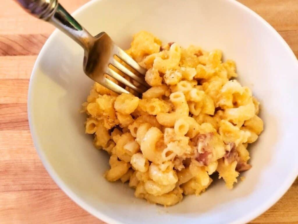 Image shows irresistible homemade mac and cheese.