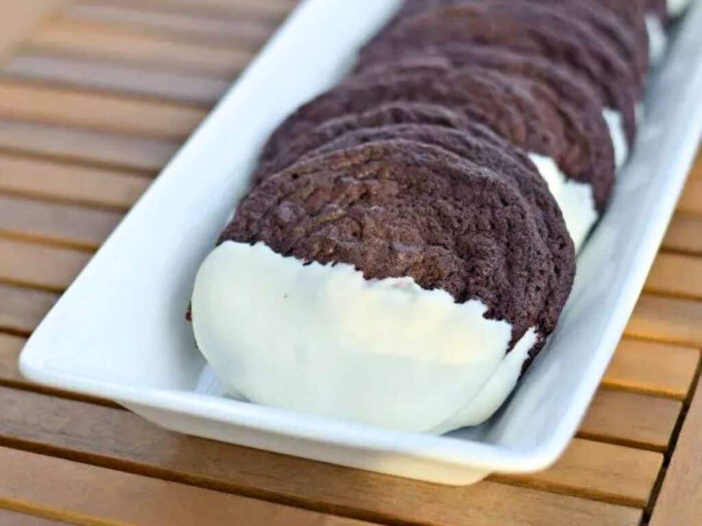 Image shows plate full of triple chocolate dipped cookies.