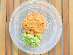 Image shows plate of yummy tamale pot pie with homemade guac.