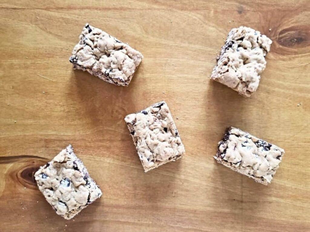 Image shows tray of irresistible chocolate chip oat bars.