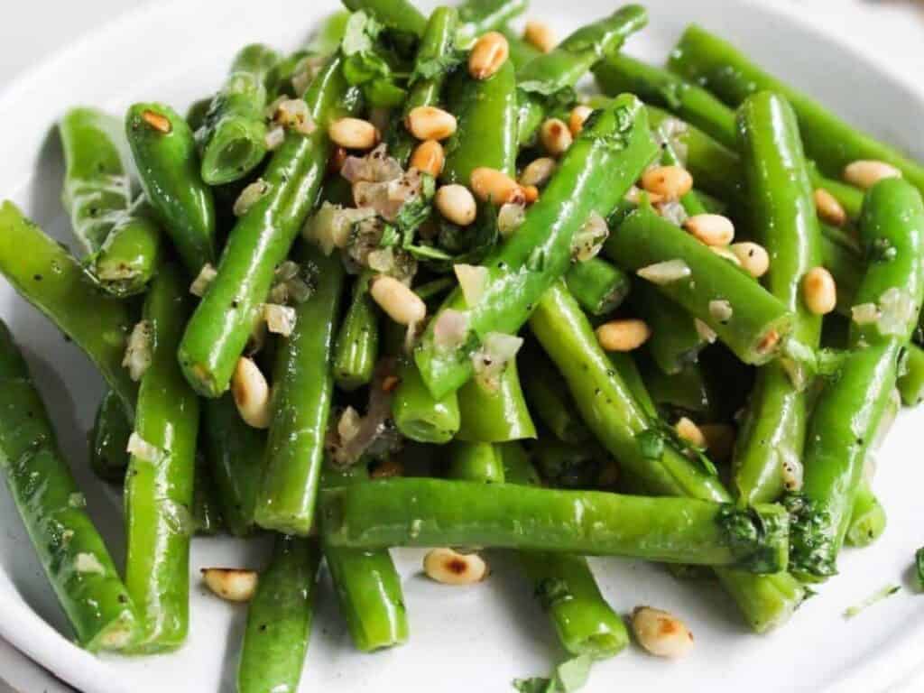 Image shows easy to make green beans with garlic butter.