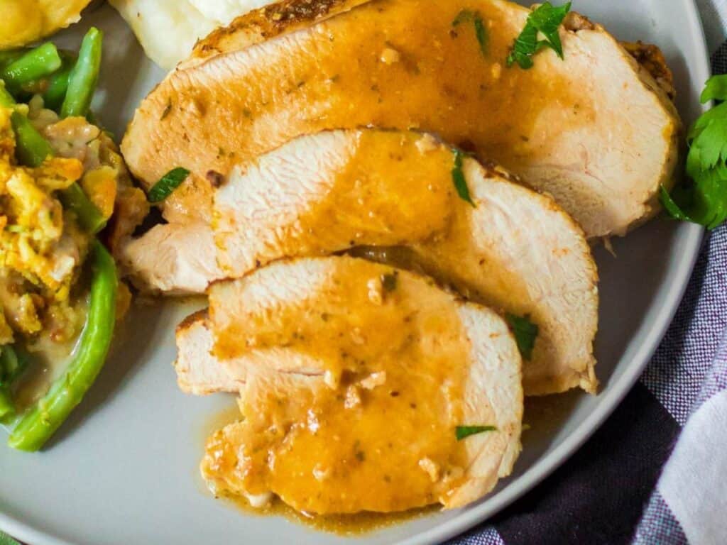 Image shows easy to make slow cooker boneless turkey breast.