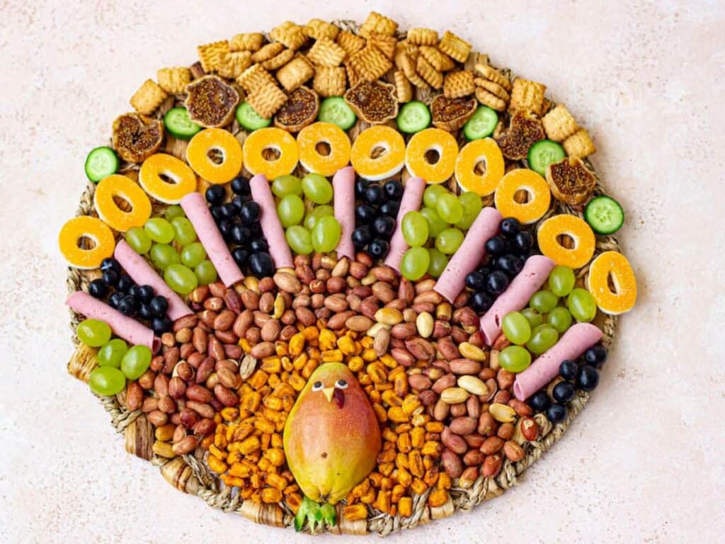 Image shows easy to make turkey charcuterie board.