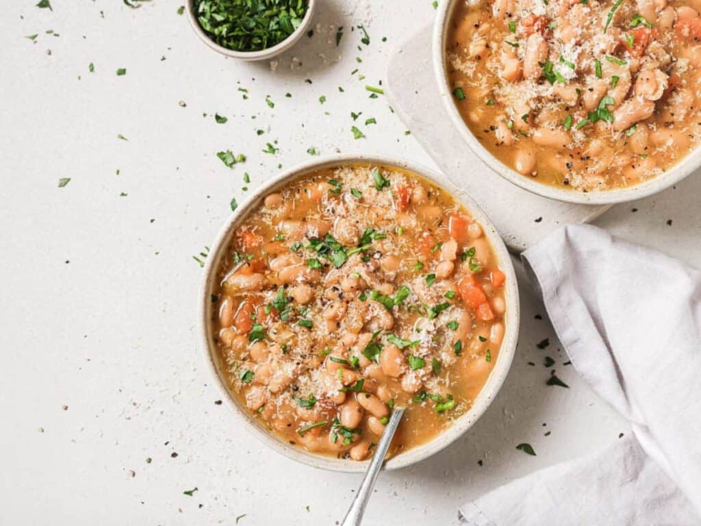 Image shows iresistible Instant Pot navy bean soup.