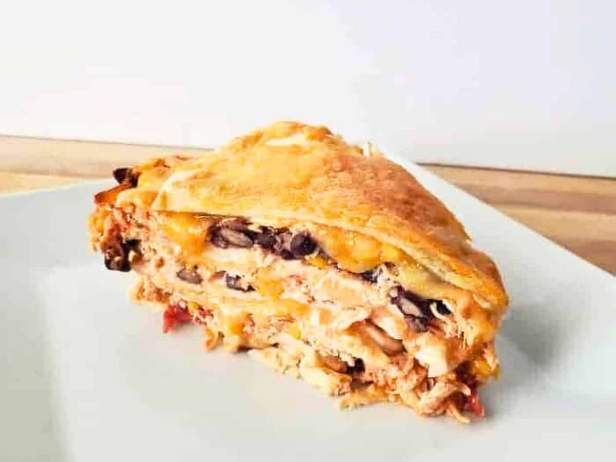 Image shows slice of irresistible Southwest tortilla pie.
