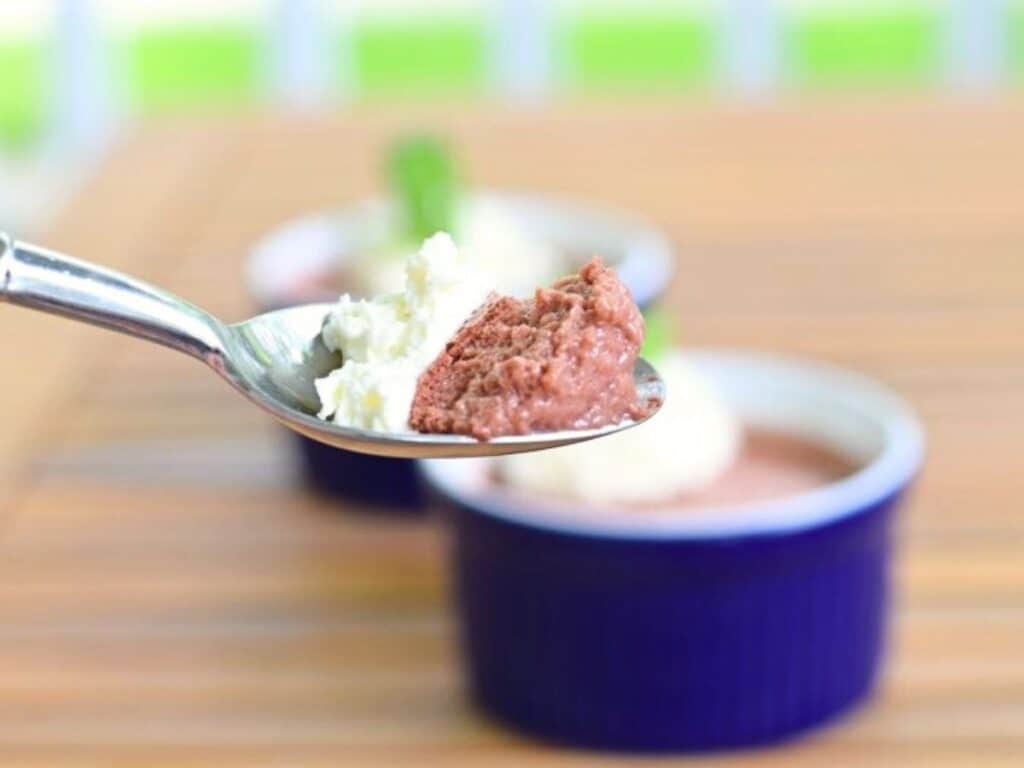 Image shows bite of yummy cherry bavarian custard.