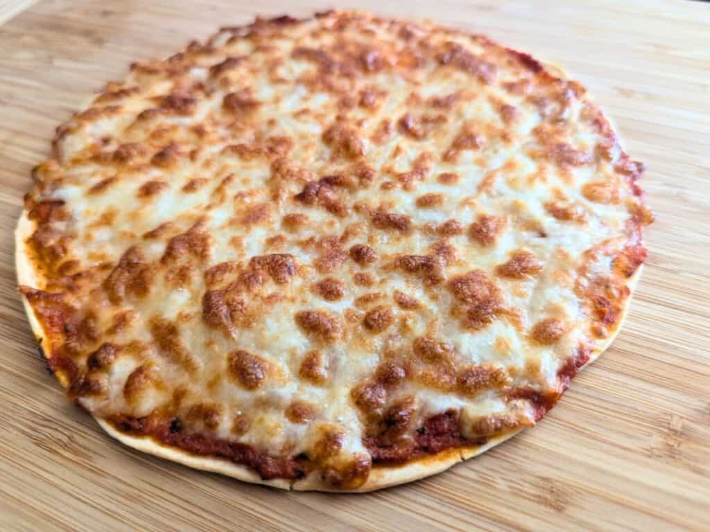 Image shows delicious air fried tortilla pizza.