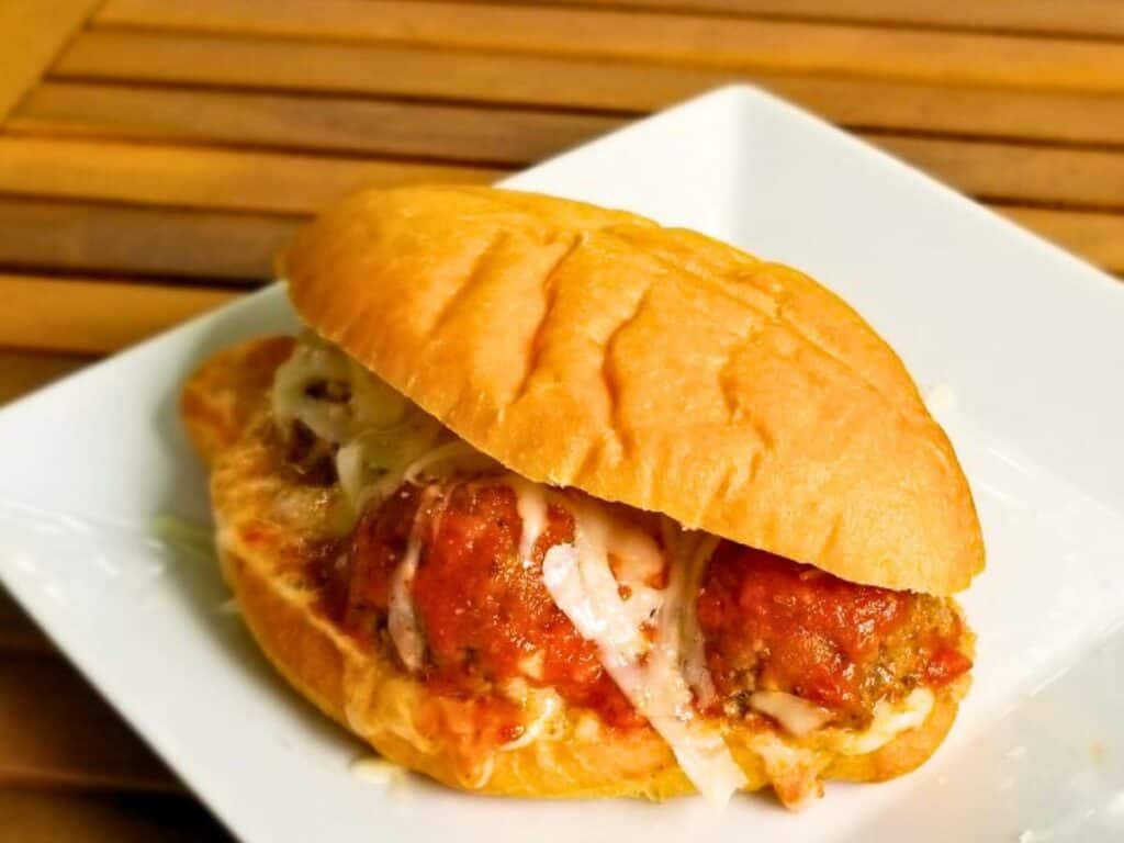 Image shows easy to make homemade meatball sandwich.