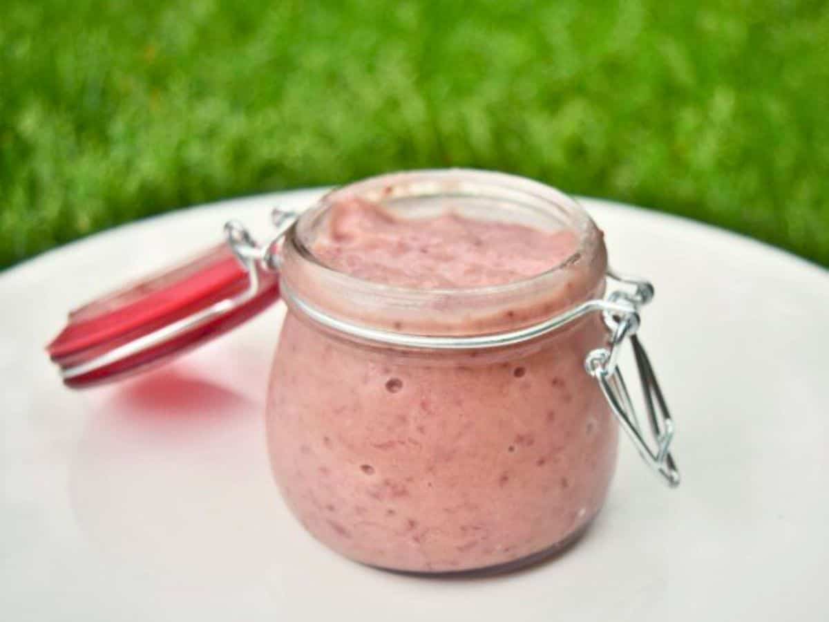Image shows jar of easy to make and homemade strawberry curd.