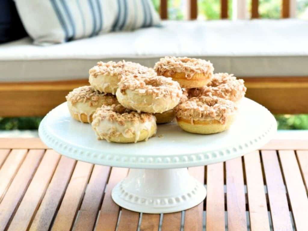 Image shows platter of yummy homemade cereal-topped doughnuts.