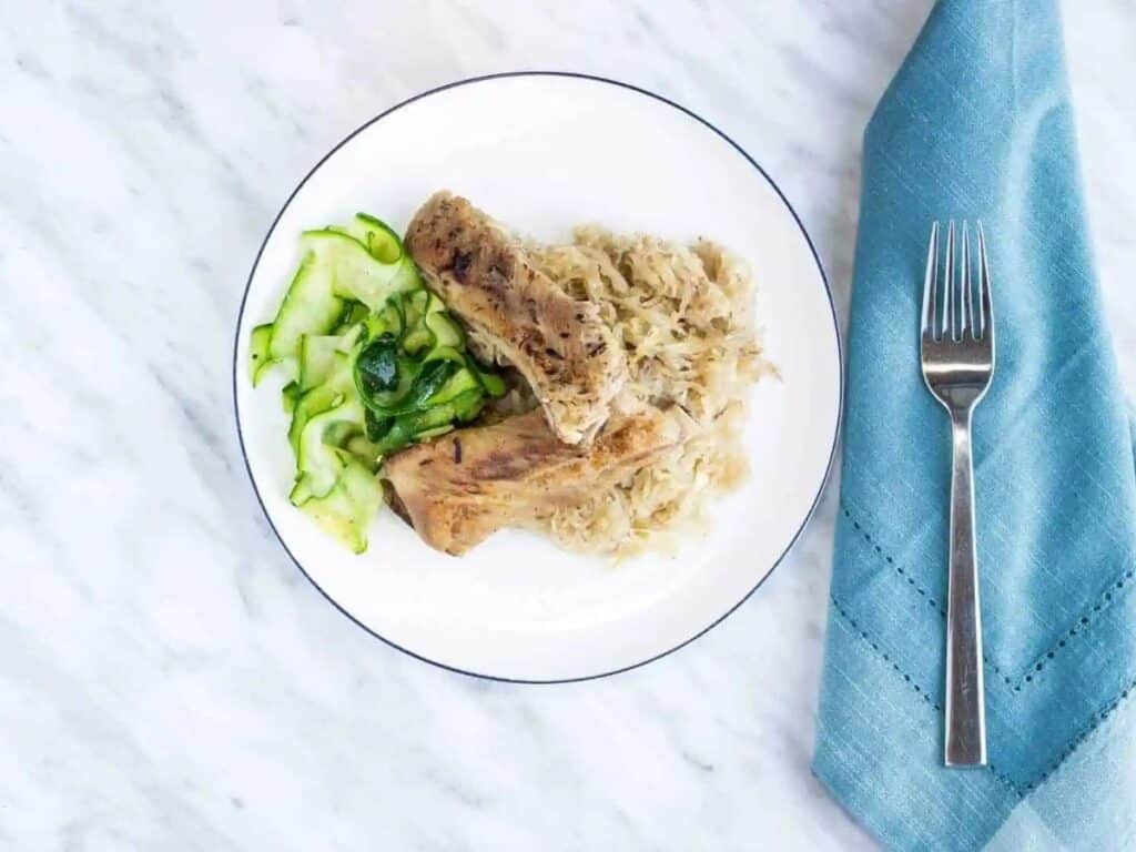 Image shows ribs and sauerkraut recipe.